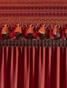 Artisanal lace intricately adorning the curtain, enhancing its elegance and charm.