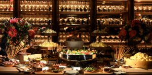 Exquisitely arranged table of food awaits guests, ready for a celebratory occasion.