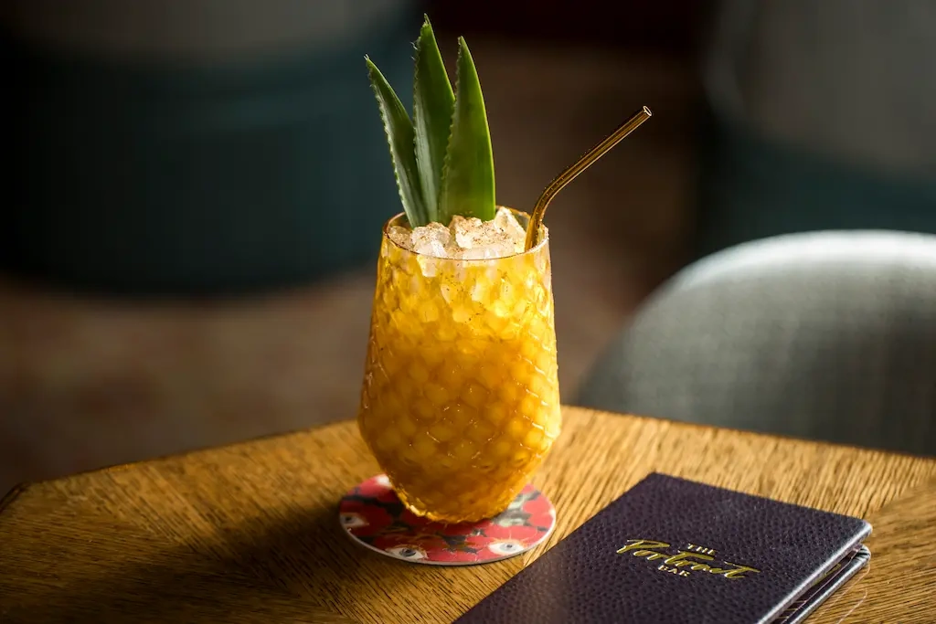 Medsker juice is served on the table alongside a notebook.