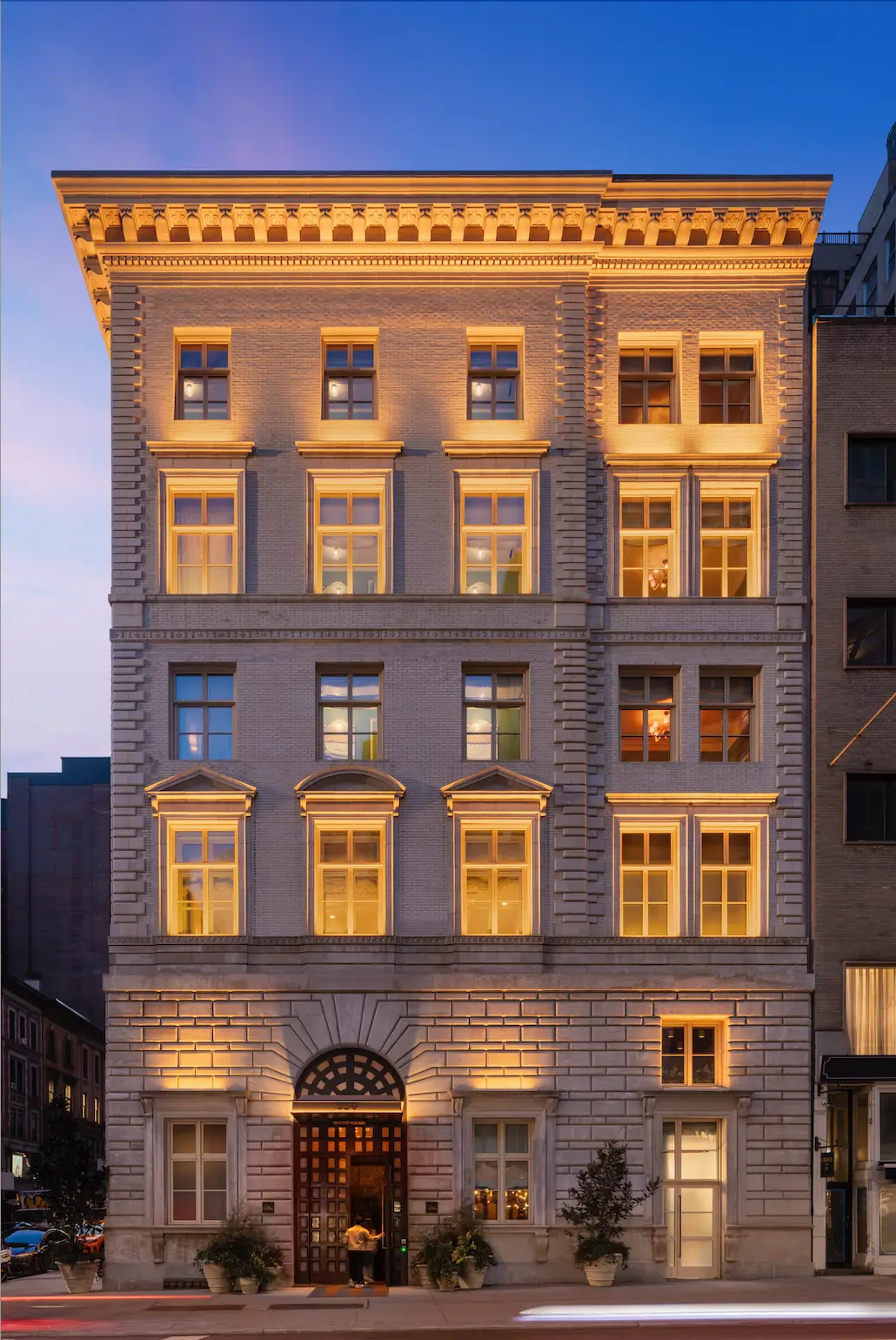 A clicked picture of a building glowing beautifully in the evening light.