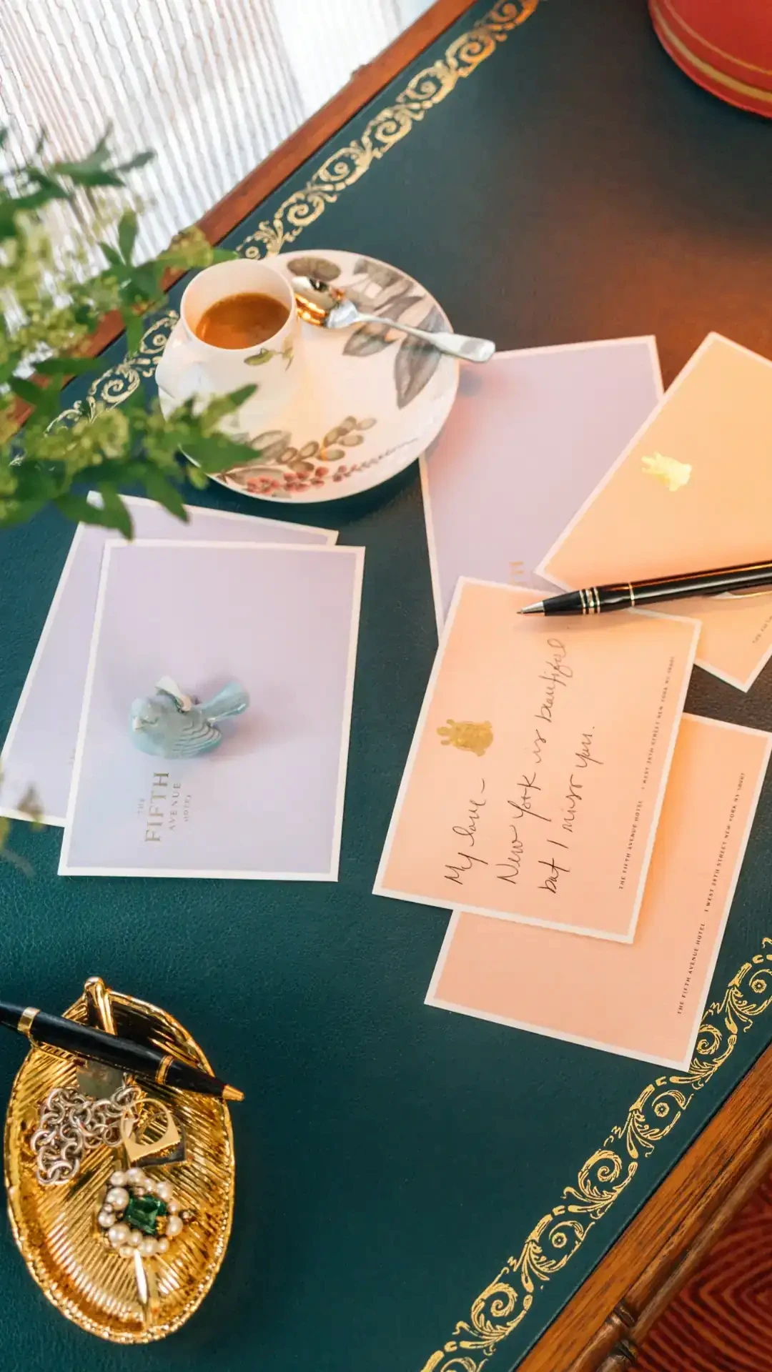 Handwritten dedication letters beside a warm cup of coffee, creating an intimate and cozy atmosphere